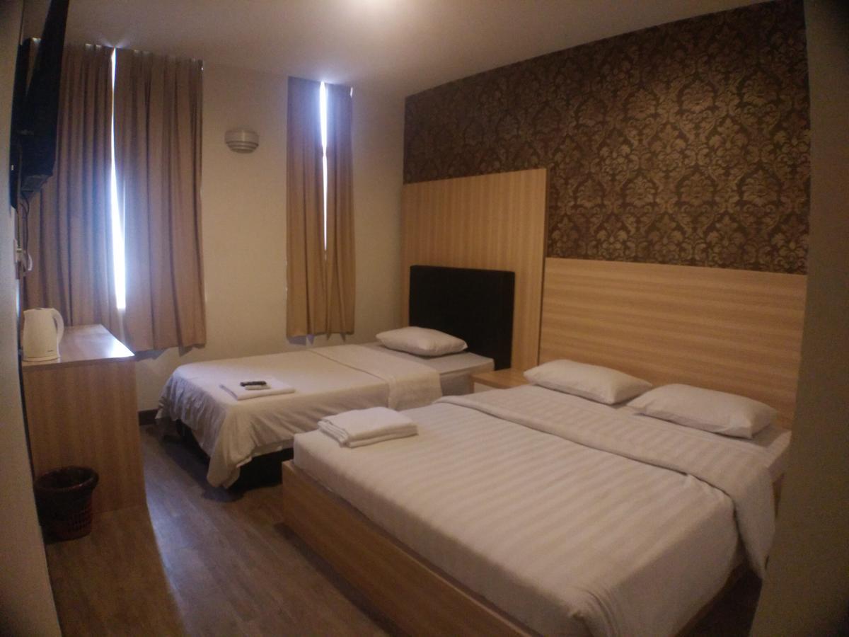 Hotel Truly Asia Кота Кинабалу Екстериор снимка